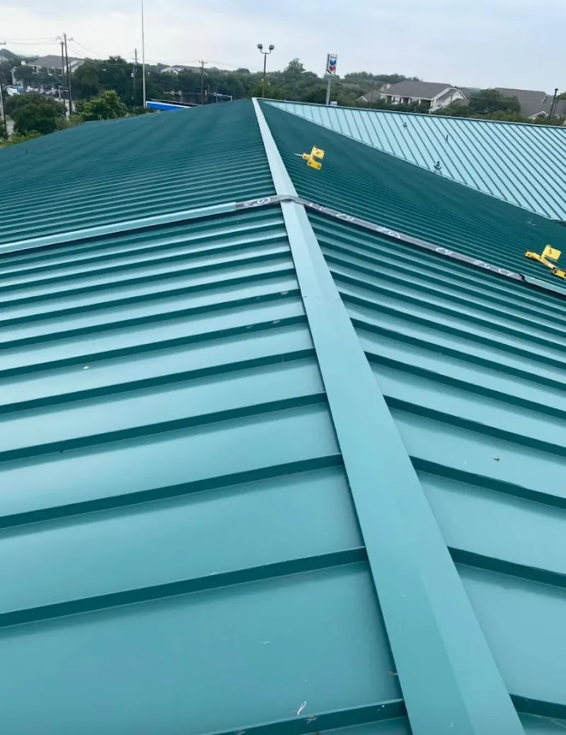 Green commercial metal roof ridge and valley for Metal Roof Repair in Houlton
