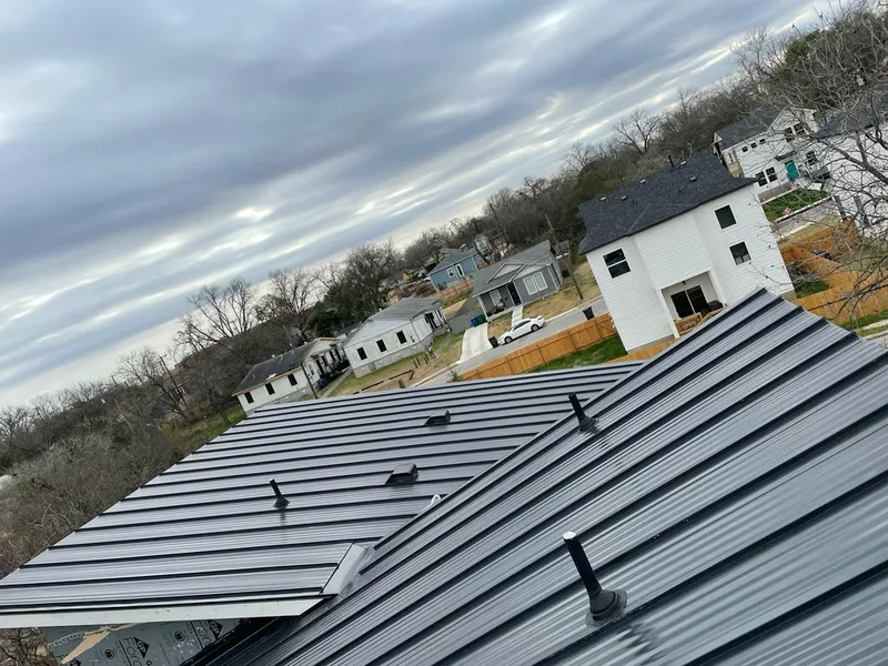 Standing seam metal roof panels with vents for Skylight Repair in Houlton